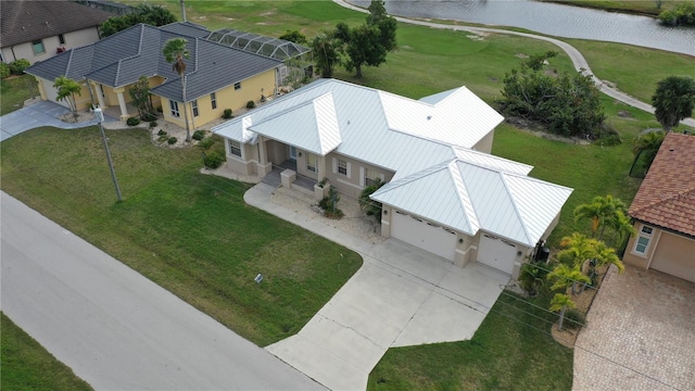 birds eye view of property featuring a water view