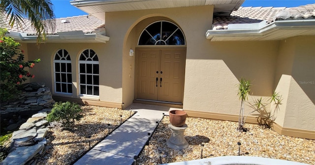 doorway to property with french doors