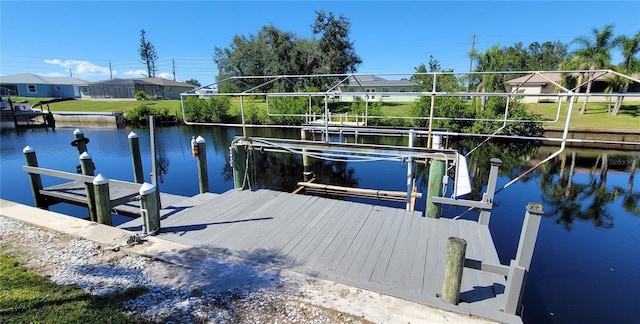 dock area with a water view