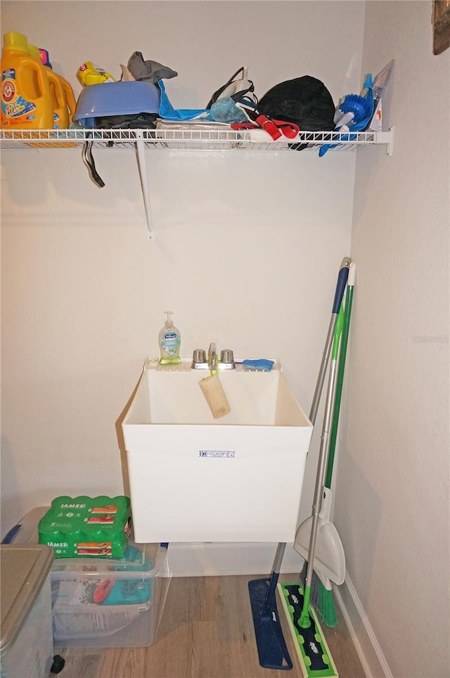 interior space featuring sink and hardwood / wood-style flooring