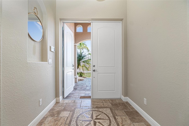 entryway featuring light tile floors