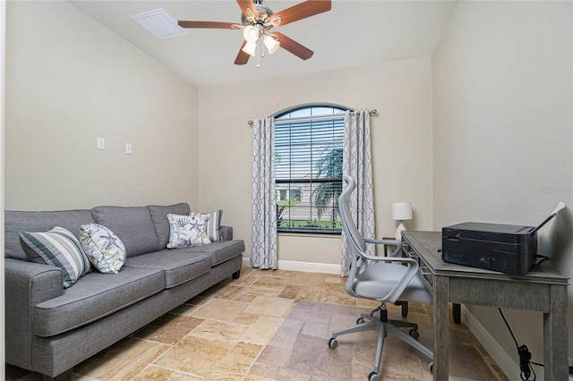 tiled home office featuring ceiling fan