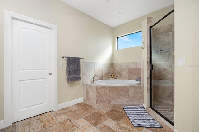 bathroom with tile floors and separate shower and tub