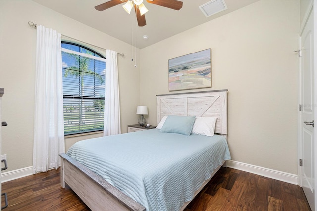 bedroom featuring dark hardwood / wood-style floors and ceiling fan