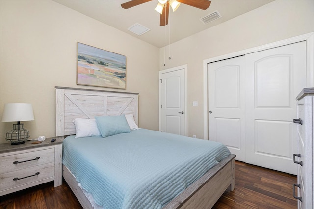 bedroom featuring a closet, ceiling fan, and dark hardwood / wood-style flooring