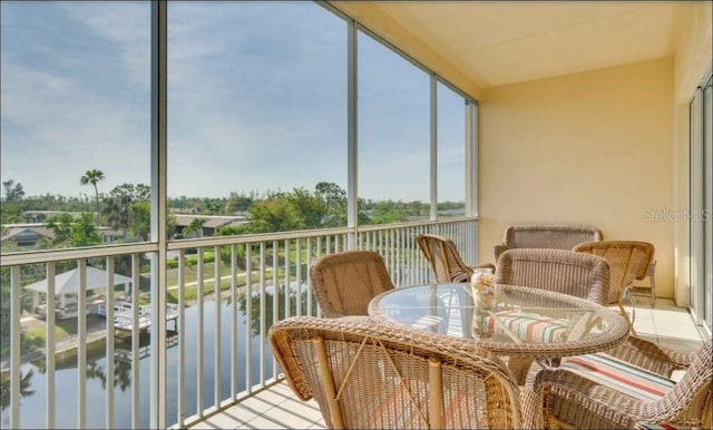 sunroom with a water view