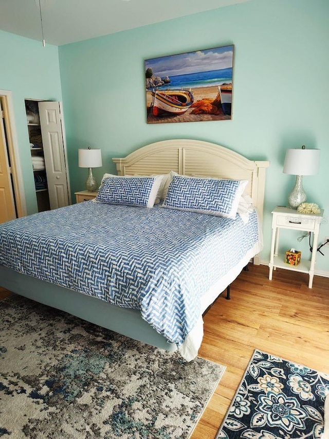 bedroom featuring light wood-type flooring