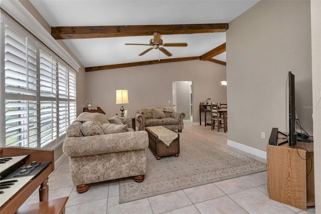 living room featuring ceiling fan, light tile flooring, and lofted ceiling with beams