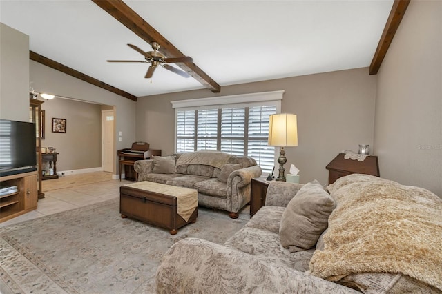 tiled living room with ceiling fan and lofted ceiling with beams