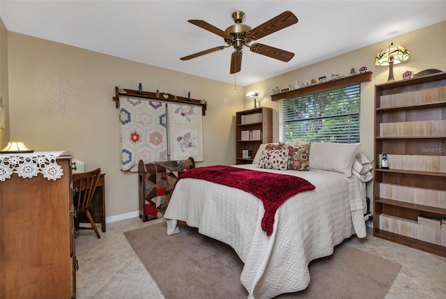 tiled bedroom with ceiling fan