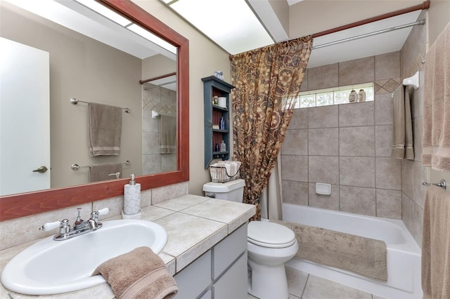 full bathroom featuring vanity, tile floors, toilet, and shower / bathtub combination with curtain