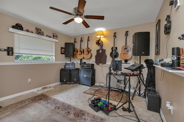 interior space with ceiling fan