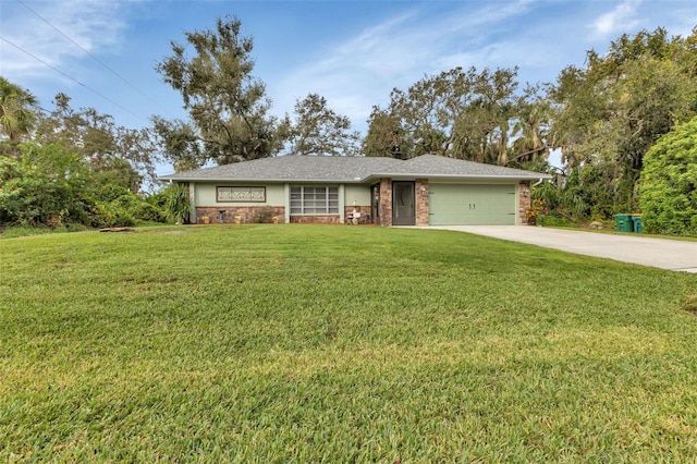 single story home with a front yard and a garage