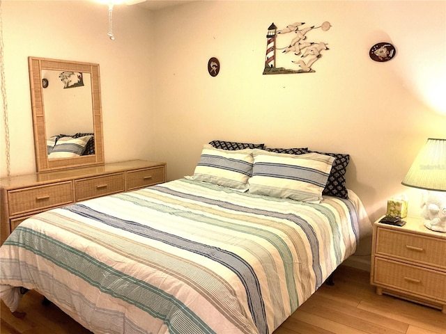 bedroom featuring light wood-type flooring