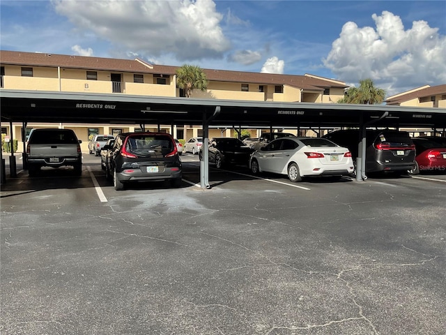 view of parking with a carport