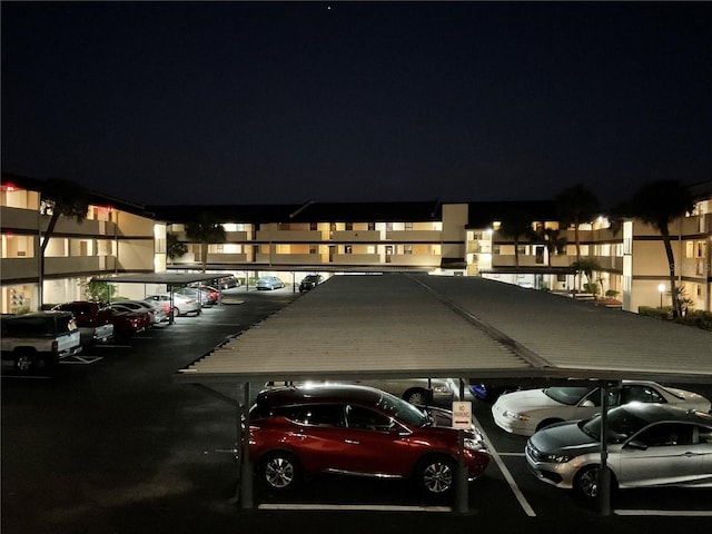 view of parking at night