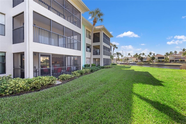 exterior space with a water view