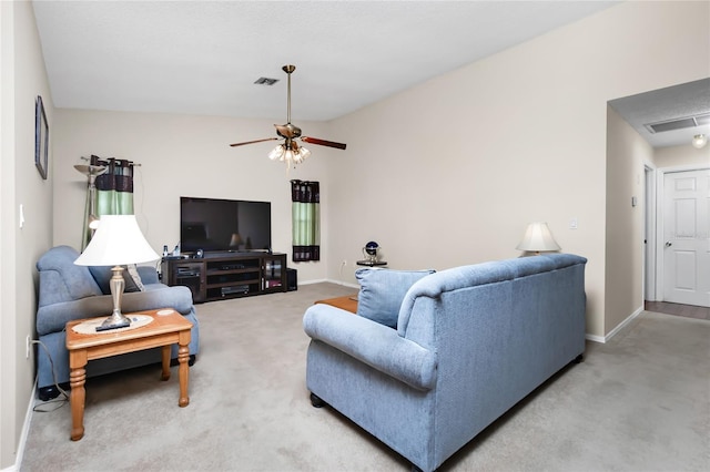 living room with ceiling fan and carpet flooring