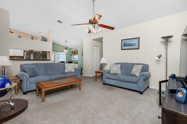 carpeted living room with lofted ceiling and ceiling fan