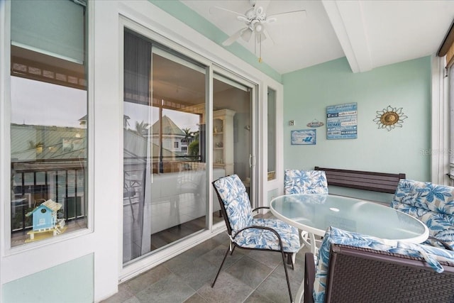 5127 Melbourne St Unit F-204, Port Charlotte, FL 33980 - sunroom featuring a ceiling fan, outdoor dining area, and beam ceiling