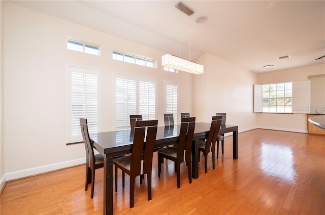 dining room with light hardwood / wood-style floors