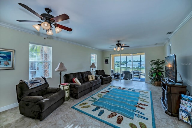 living room featuring ornamental molding and light tile patterned flooring