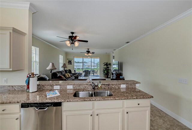 kitchen with ornamental molding, a sink, stainless steel dishwasher, open floor plan, and a peninsula