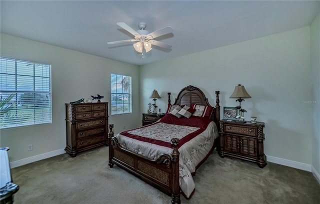 bedroom with carpet flooring, baseboards, and ceiling fan