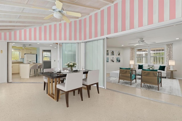 dining area featuring ceiling fan