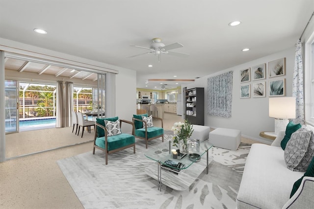 living room featuring ceiling fan