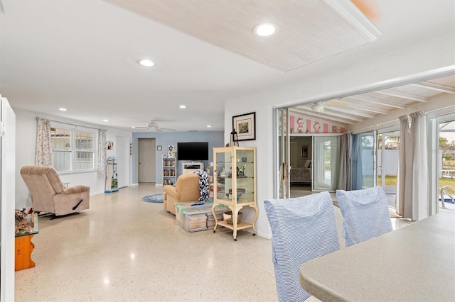 living room with ceiling fan