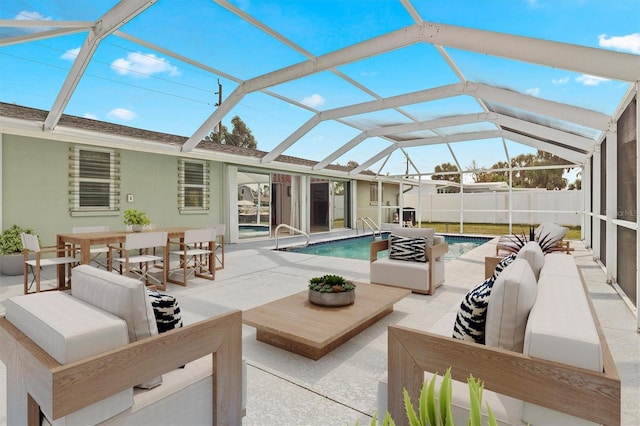 view of patio with a fenced in pool, an outdoor living space, and glass enclosure