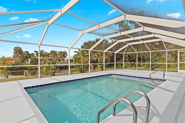 view of pool featuring a lanai, a patio, and a water view