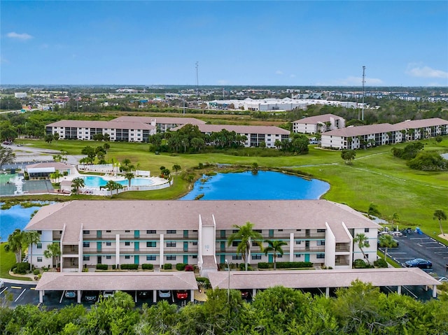 birds eye view of property featuring a water view