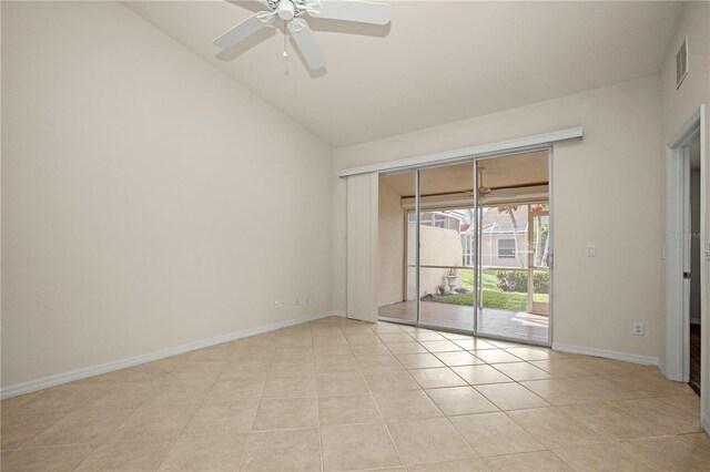 unfurnished room with ceiling fan, light tile patterned floors, and lofted ceiling