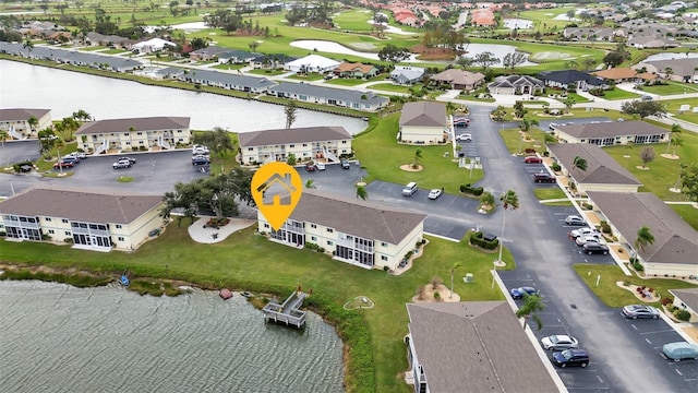 aerial view featuring a residential view and a water view