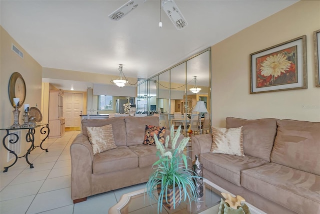 living room with light tile patterned floors