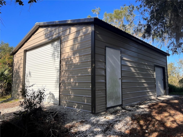 view of outdoor structure with a garage