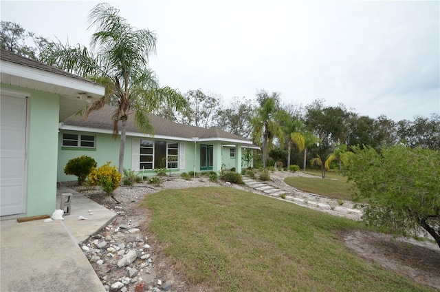 view of yard featuring a garage