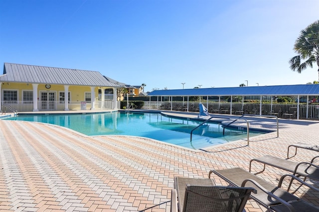 view of pool featuring a patio