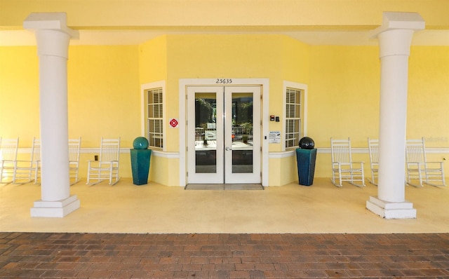 doorway to property featuring french doors