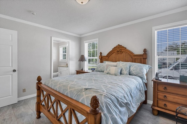 bedroom with ornamental molding, ensuite bathroom, and a textured ceiling