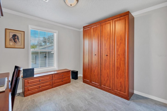 office area featuring a textured ceiling and crown molding