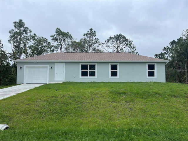 single story home with a front lawn and a garage