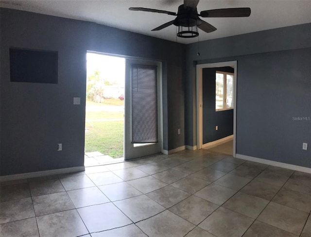 4127 Gardner Dr, Port Charlotte, FL 33952 - spare room featuring a ceiling fan, tile patterned flooring, and baseboards