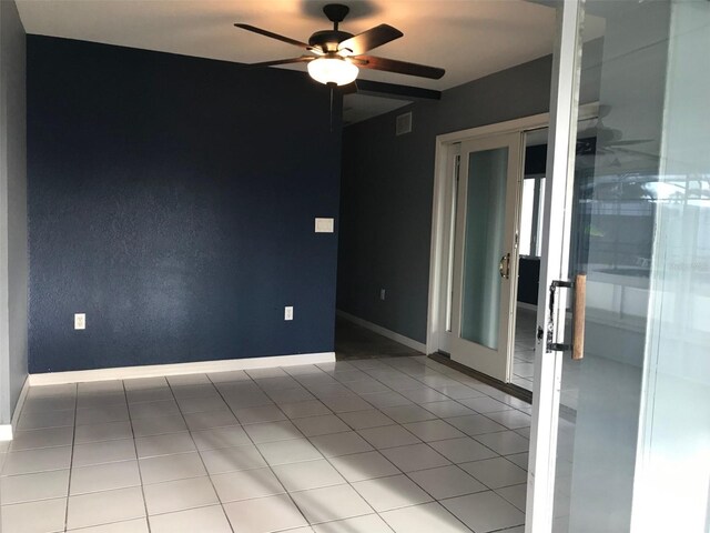 4127 Gardner Dr, Port Charlotte, FL 33952 - empty room featuring a ceiling fan, visible vents, baseboards, and tile patterned floors