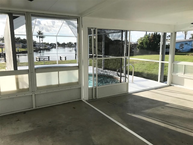 4127 Gardner Dr, Port Charlotte, FL 33952 - unfurnished sunroom featuring a water view