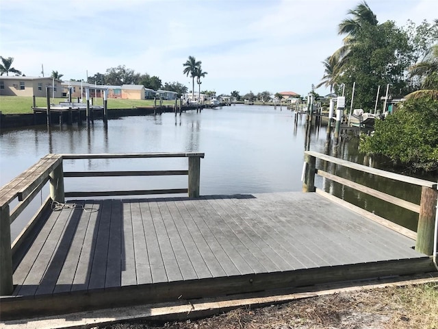4127 Gardner Dr, Port Charlotte, FL 33952 - view of dock featuring a water view and boat lift
