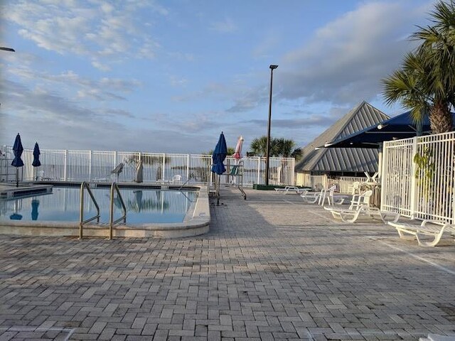 4127 Gardner Dr, Port Charlotte, FL 33952 - community pool featuring fence