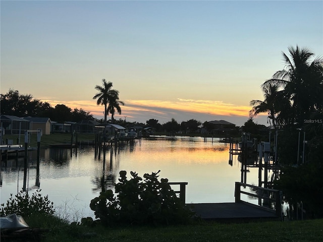 4127 Gardner Dr, Port Charlotte, FL 33952 - property view of water featuring a dock and boat lift